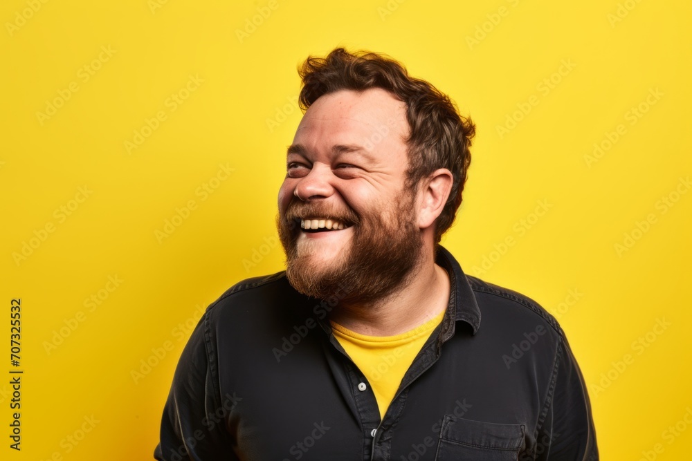 Portrait of a funny man laughing over yellow background. Emotions concept. Portrait of a funny man laughing over yellow background. Emotions concept.