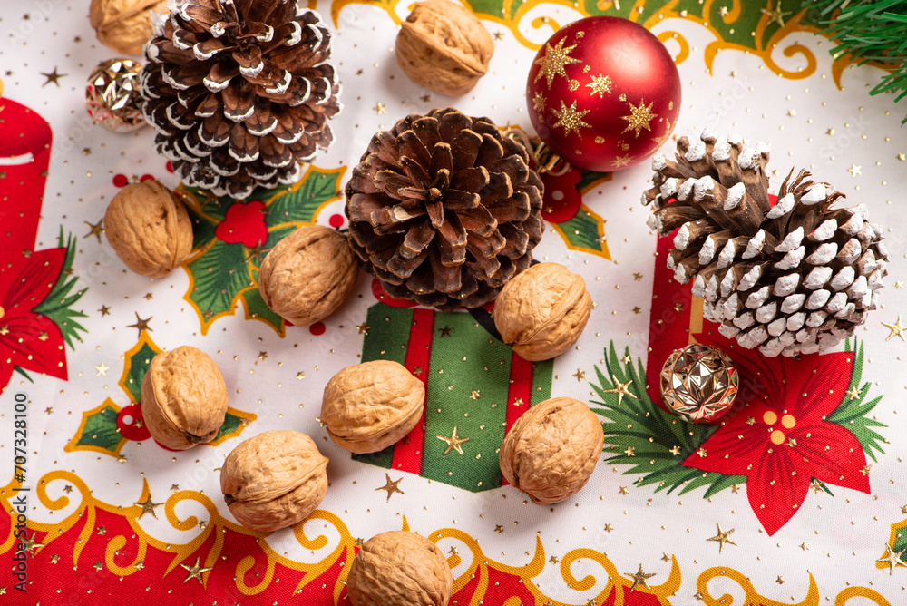 Christmas table, a beautiful table with nuts and christmas accessories, selective focus.