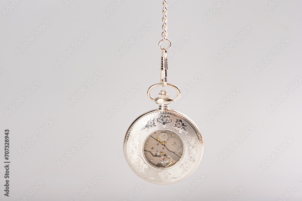 Antique watch, beautiful antique pocket watch with white background, selective focus. Antique watch, beautiful antique pocket watch with white background, selective focus.