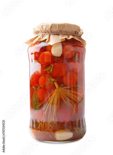 Canned cherry tomatoes in a jar isolated on white background