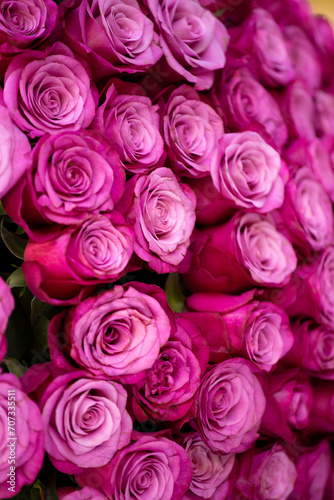 Huge bouquet of beautiful pink roses as background, floral background.