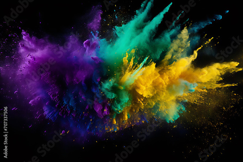Colored powder explosion. Colorful purple, green, gold colors dust on black background. Holi paint powder splash in colors of Mardi gras carnival photo