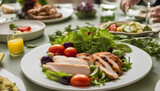 A healthy plate featured a colourful salad of red tomatoes, organic vegetables and tender chicken with olives.