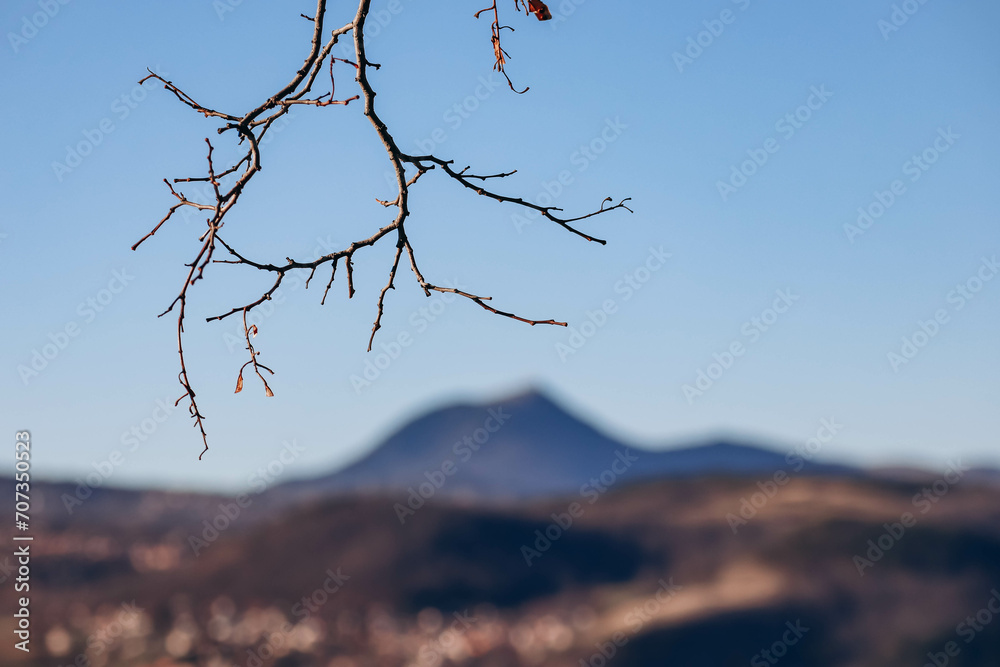 View of the famous Puy de Dome volcano in the Auvergne region, France View of the famous Puy de Dome volcano in the Auvergne region, France