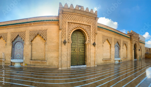  Arabic Door, Arabic oriental styled door in Rabat, Morocco. Panoramic view of square and Mausoleum of King Mohammed V located on opposite side Hassan Tower in Rabat. Morocco  photo