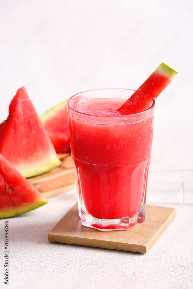 Glass of tasty watermelon fresh on light background