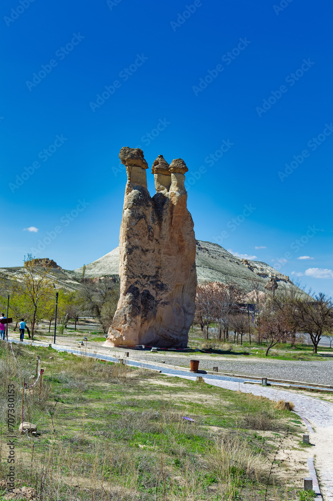 Cappadocia landscape soft volcanic rock, shaped by erosion into towers.