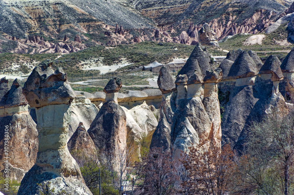 Cappadocia landscape soft volcanic rock, shaped by erosion into towers.