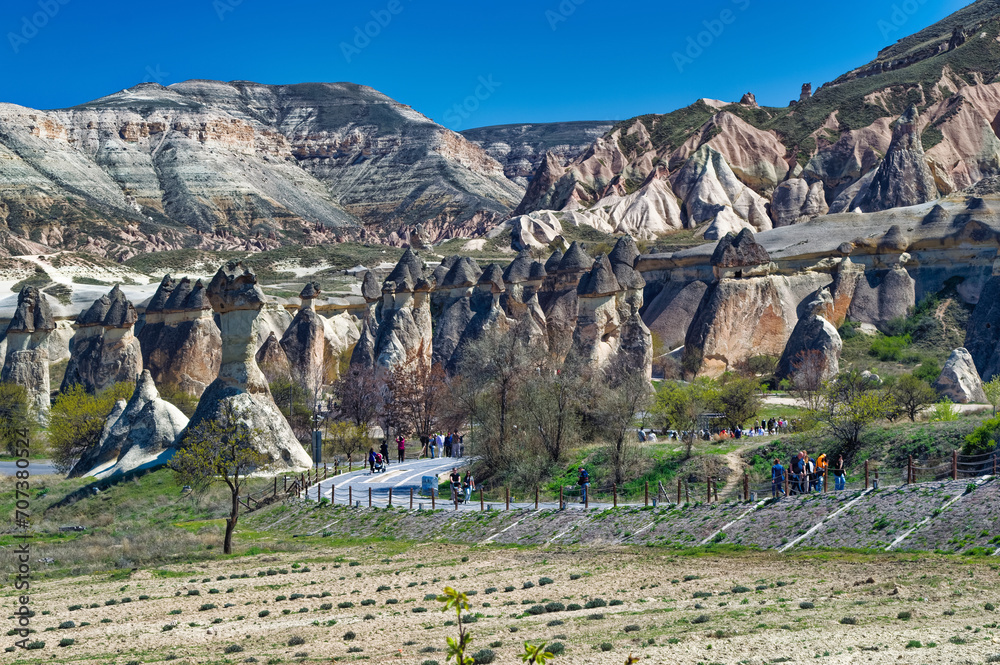 Cappadocia landscape soft volcanic rock, shaped by erosion into towers.