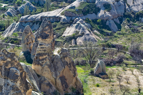 Cappadocia landscape soft volcanic rock, shaped by erosion into towers.