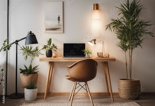 Stylish scandinavian open space with design furniture plants bamboo bookstand and wooden desk Brown working space Work from home Remote work photo