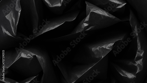 black satin fabric, Black crumpled polished carton texture in low light background, Website, application, modern popular games template. Computer, laptop wallpaper. Design for landing, product place