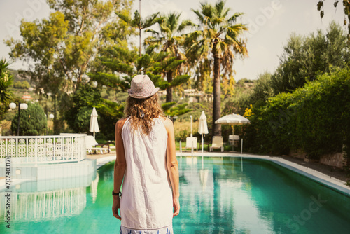 woman by the pool summer vacation © Melinda Nagy