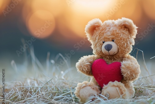 Teddy bear holding a heart © furyon