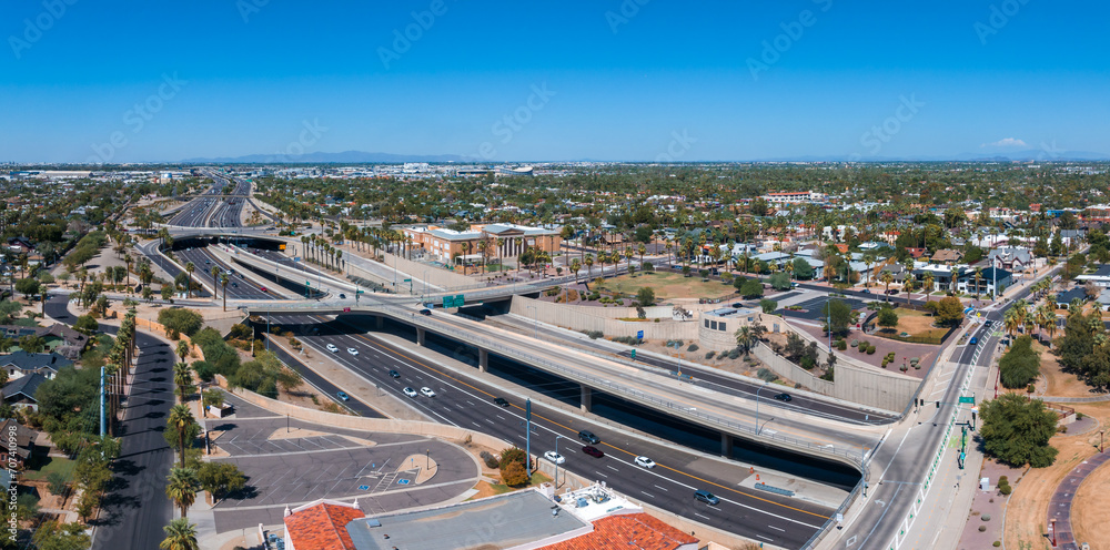 Fototapeta premium Phoenix city downtown skyline cityscape of Arizona in USA. Top view of downtown Phoenix Arizona on a summer day in USA.