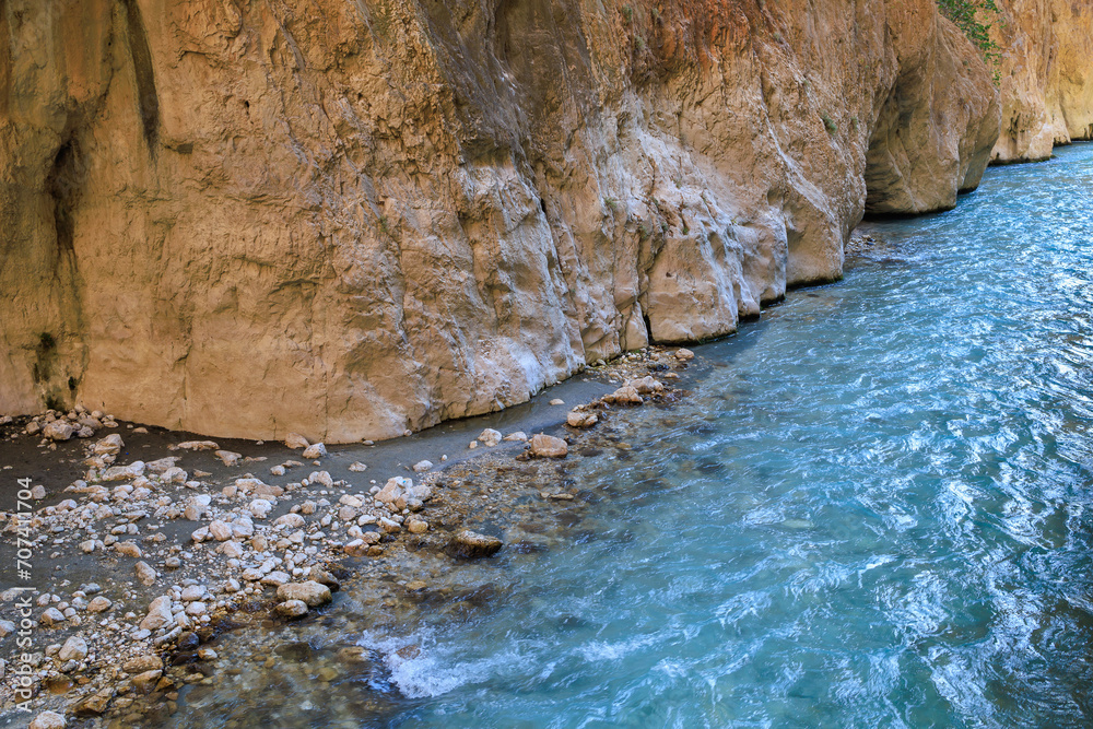 Saklikent Canyon in Turkey with mountain cold stormy water in the river. Natural attraction, popular place for tourists