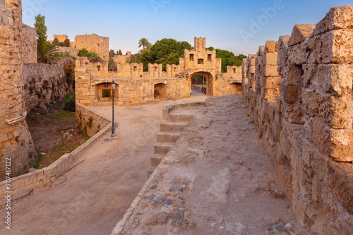 Old stone fortress wall in the city of Rhodes.