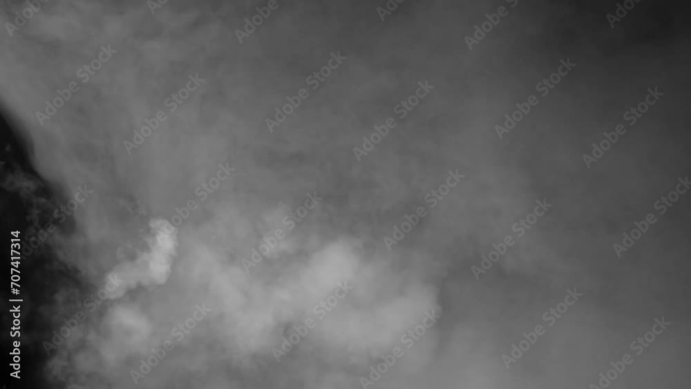 Abstract white smoke in slow motion. Smoke, Cloud of cold fog in light spot background. Light, white, fog, cloud, black background, 4k, ice smoke cloud. Floating fog.