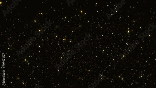 Gold dust particles fly in slow motion in the air lingering slowly. Dust Particles Background Bokeh Lights Background on Black Background 4k Footage Snow Particles Background. photo