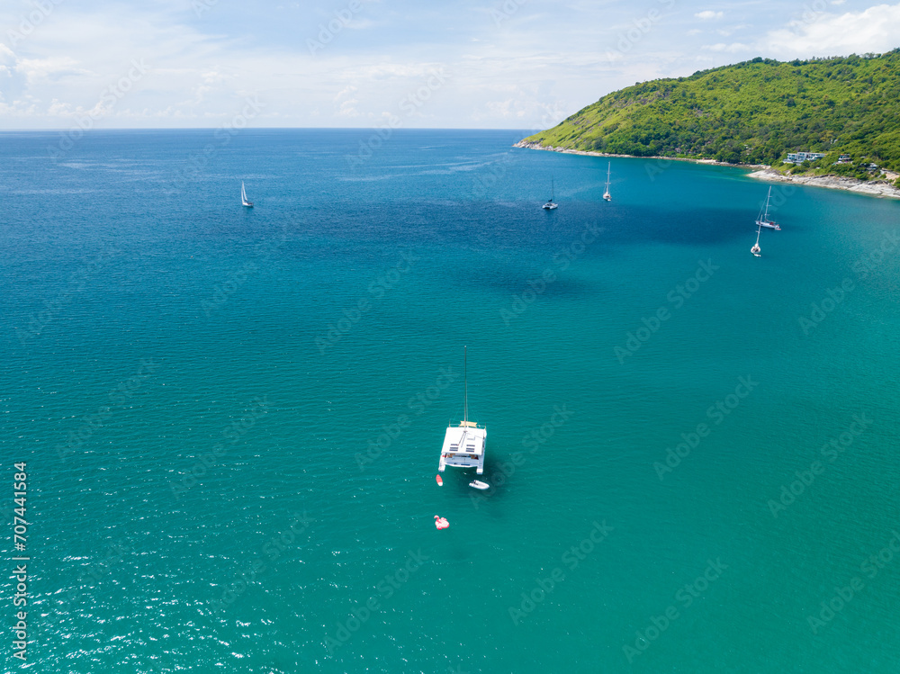 Yacht sailing in open sea Phuket island Thailand,Beautiful sea summer seascape with Sailing boat,Luxury Yacht from drone
