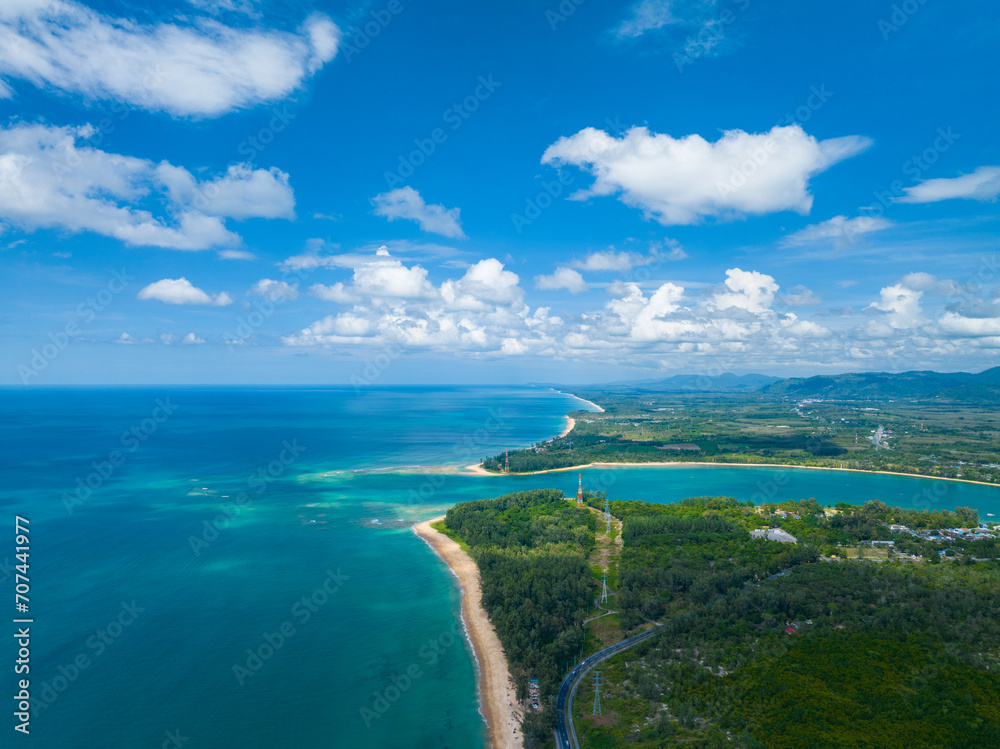 Fototapeta premium High angle view of the sea Beautiful beach near the road at Phuket island Thailand,Amazing landscape bird eye view clouds blue sky background