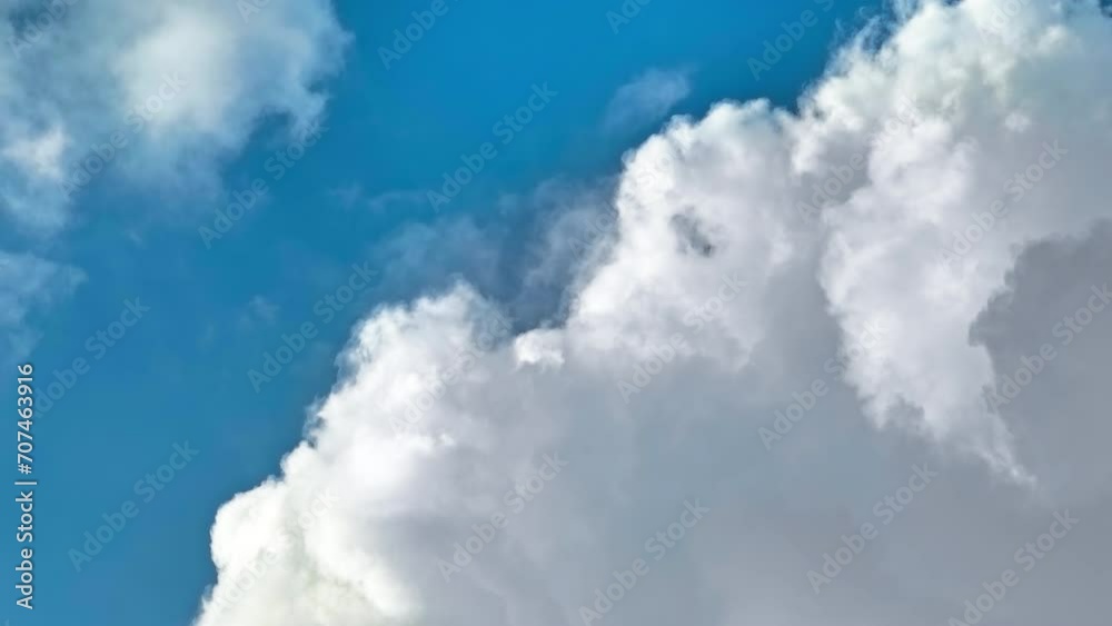 Long lens panning close-up shot of beautiful clouds in the sky. Nature environment background Long lens panning close-up shot of beautiful clouds in the sky. Nature environment background