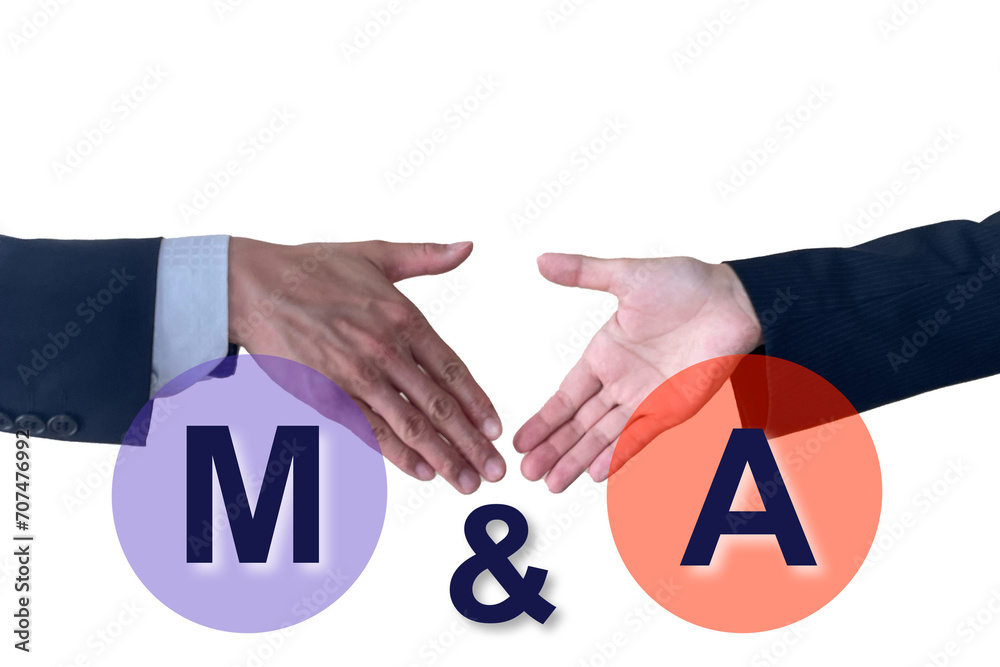 Fotografie M&Aのイメージと握手するビジネスマン