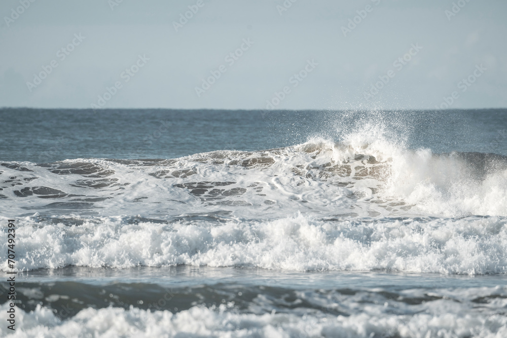 Ocean big wave coming with foam and sea 