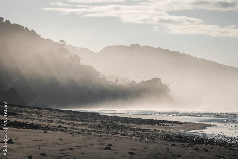 Ocean view with big waves in the morning with beautiful fog in Dominical, Costa Rica surf header banner background pretty yoga peaceful mindful relax Ocean view with big waves in the morning with beautiful fog in Dominical, Costa Rica surf header banner background pretty yoga peaceful mindful relax