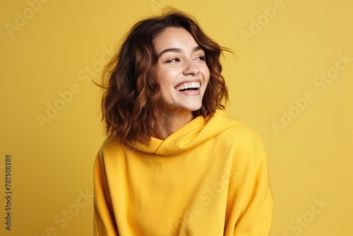Smiling Woman in Yellow Hoodie © pham