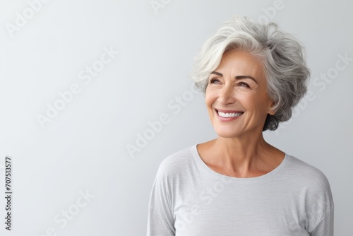 Happy Older Woman Smiling and Making Eye Contact With the Camera