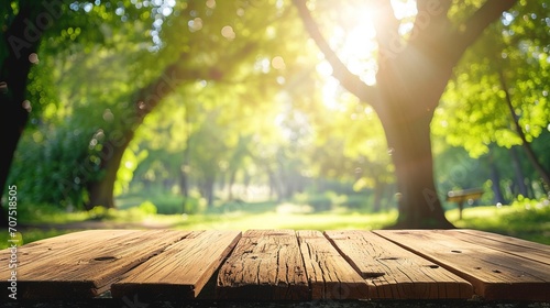 Nature background, Wood table for food and product display over blur green tree garden, Blue park nature outdoor and wood table with bokeh light background in spring and summer
