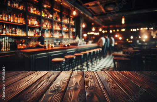 Wooden table with blurry alcohol bar or liquor cafe background
