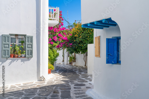 Fototapeta Naklejka Na Ścianę i Meble -  Beautiful street view of Mykonos village. Traditional Greek architecture. Mykonos island