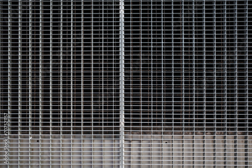 Geometric Serenity: The Artistic Symmetry of an Industrial Metal Grid. 