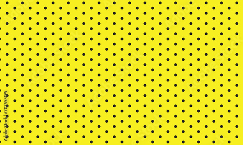 abstract black dot pattern with yellow background.