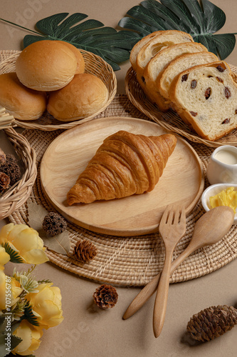 Croissants on a wooden plate