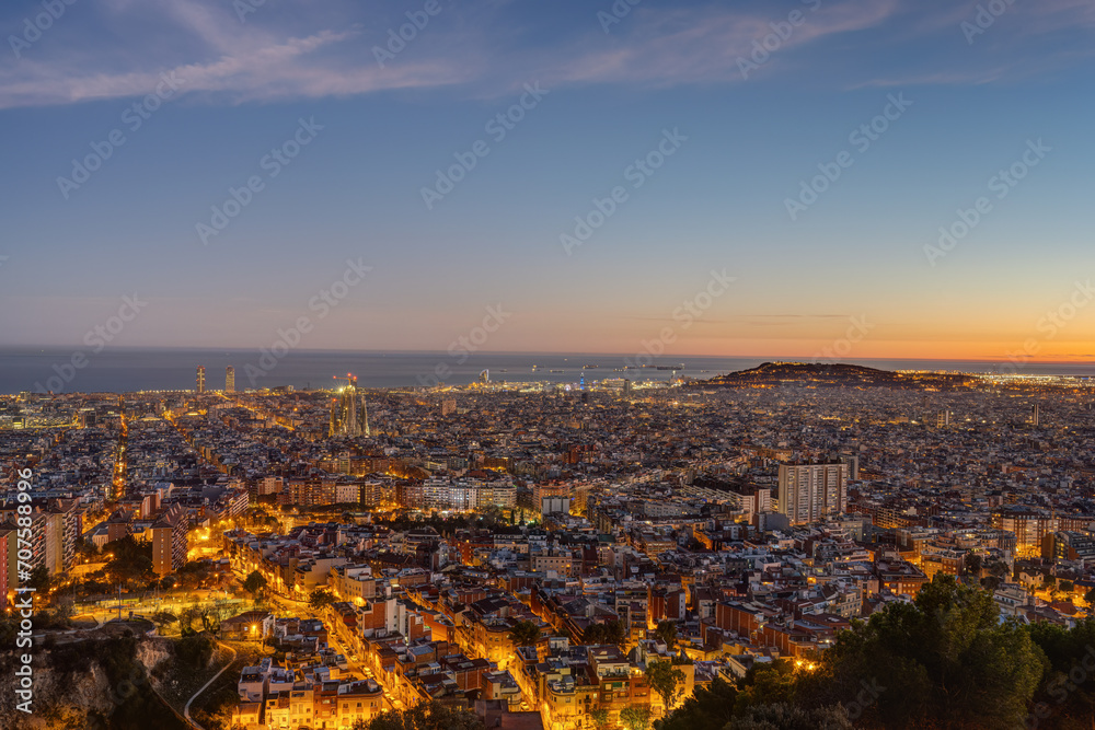 The skyline of Barcelona in Spain after sunset