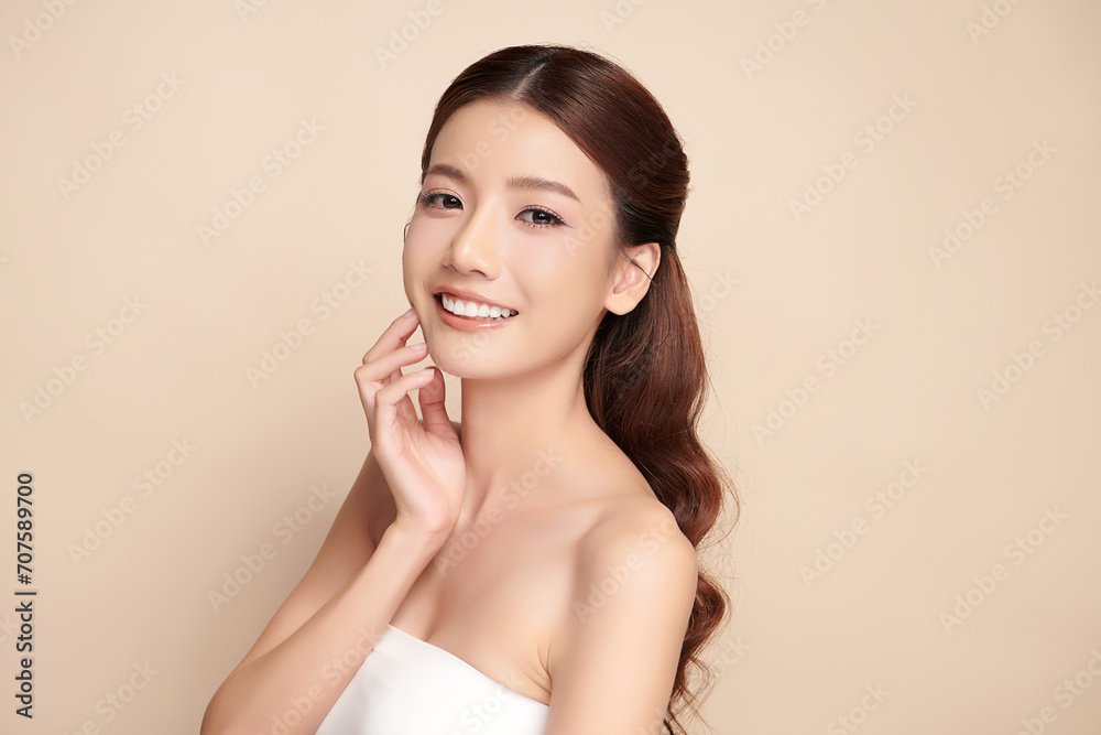 Beautiful young asian woman with clean fresh skin on beige background, Face care, Facial treatment, Cosmetology, beauty and spa, Asian women portrait. Beautiful young asian woman with clean fresh skin on beige background, Face care, Facial treatment, Cosmetology, beauty and spa, Asian women portrait.