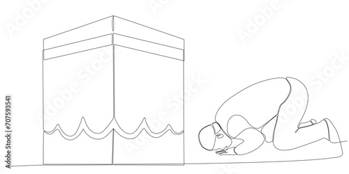 A continuous line drawing of a man facing the Ka'aba raised his hand in prayer. Muslim men pray for Allah and raise their hands facing the Kaaba isolated on white background