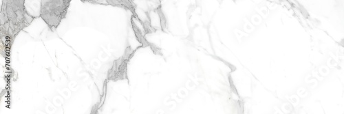 white satvario marble. texture of white Faux marble. calacatta glossy marbel with grey streaks. Thassos statuarietto tiles. Portoro texture of stone. Like emperador and travertino marbl. photo