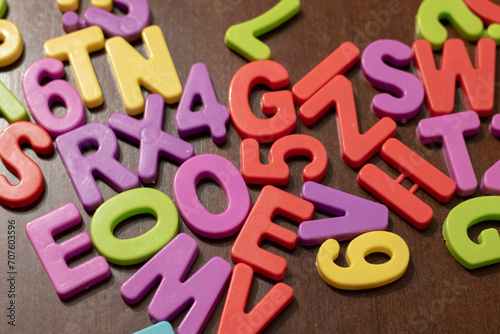 Kids showing colorful plastic numbers. Pre schoolers learning math at home. Prepare to school.