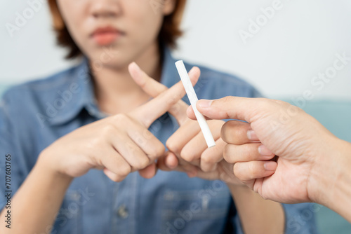 No smoking. Woman stop smoke  refuse  reject  break take cigarette  say no. quit smoking for health. world tobacco day. drugs  Lung Cancer  emphysema   Pulmonary disease  narcotic  nicotine effect