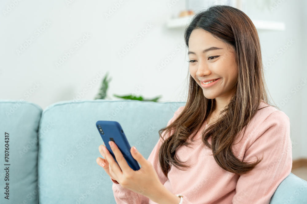 woman using smartphone for online shopping at home. Hand holding mobile phone with payment detail page display and credit card, stay home, technology, electronic commerce, internet, market place woman using smartphone for online shopping at home. Hand holding mobile phone with payment detail page display and credit card, stay home, technology, electronic commerce, internet, market place