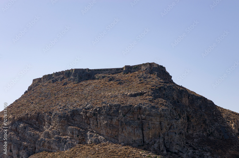Fototapeta premium Old fortress on the rock of an island in Greec