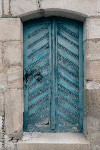 old blue wooden door in old town