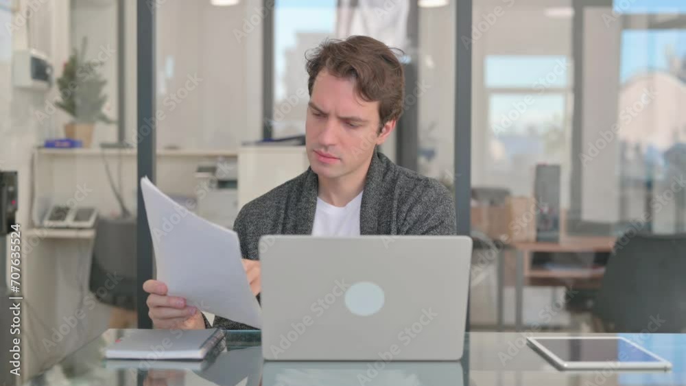 Middle Aged Man Doing Multitasking at Work Middle Aged Man Doing Multitasking at Work