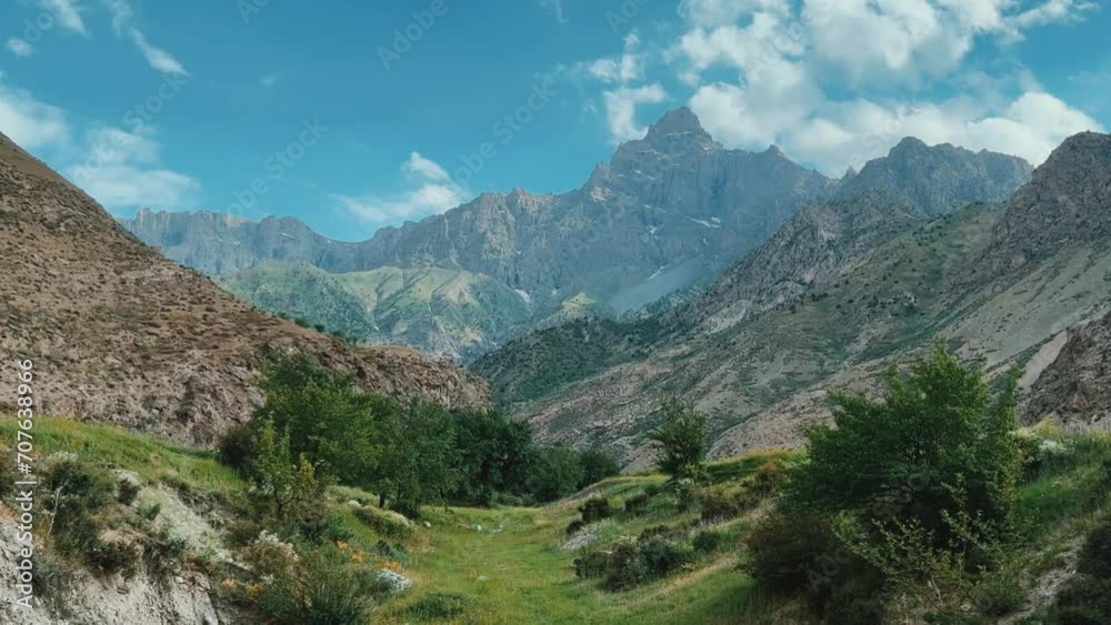 Mountain landscape of the Fan Mountains on a sunny summer day, Tajikistan, Central Asia. Fan Mountains in the heart of Tajikistan. 4K Mountain landscape of the Fan Mountains on a sunny summer day, Tajikistan, Central Asia. Fan Mountains in the heart of Tajikistan. 4K