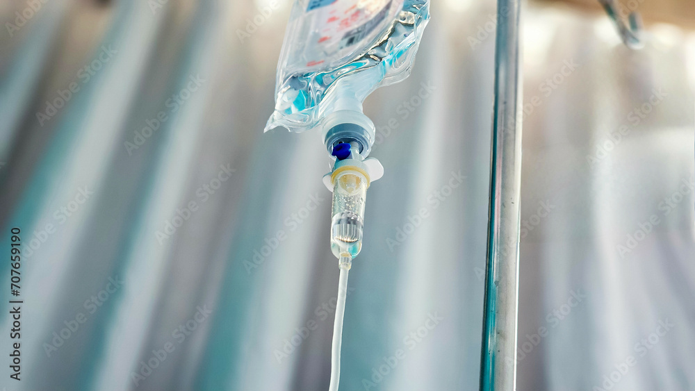 Normal saline solution (NSS) bag and infusion pump for patient in the