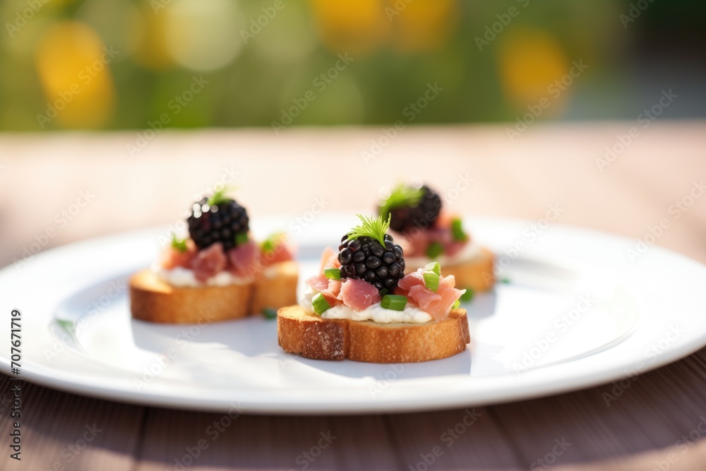 blackberry tartare on mini toasts for appetizer - obrazy, fototapety, plakaty 